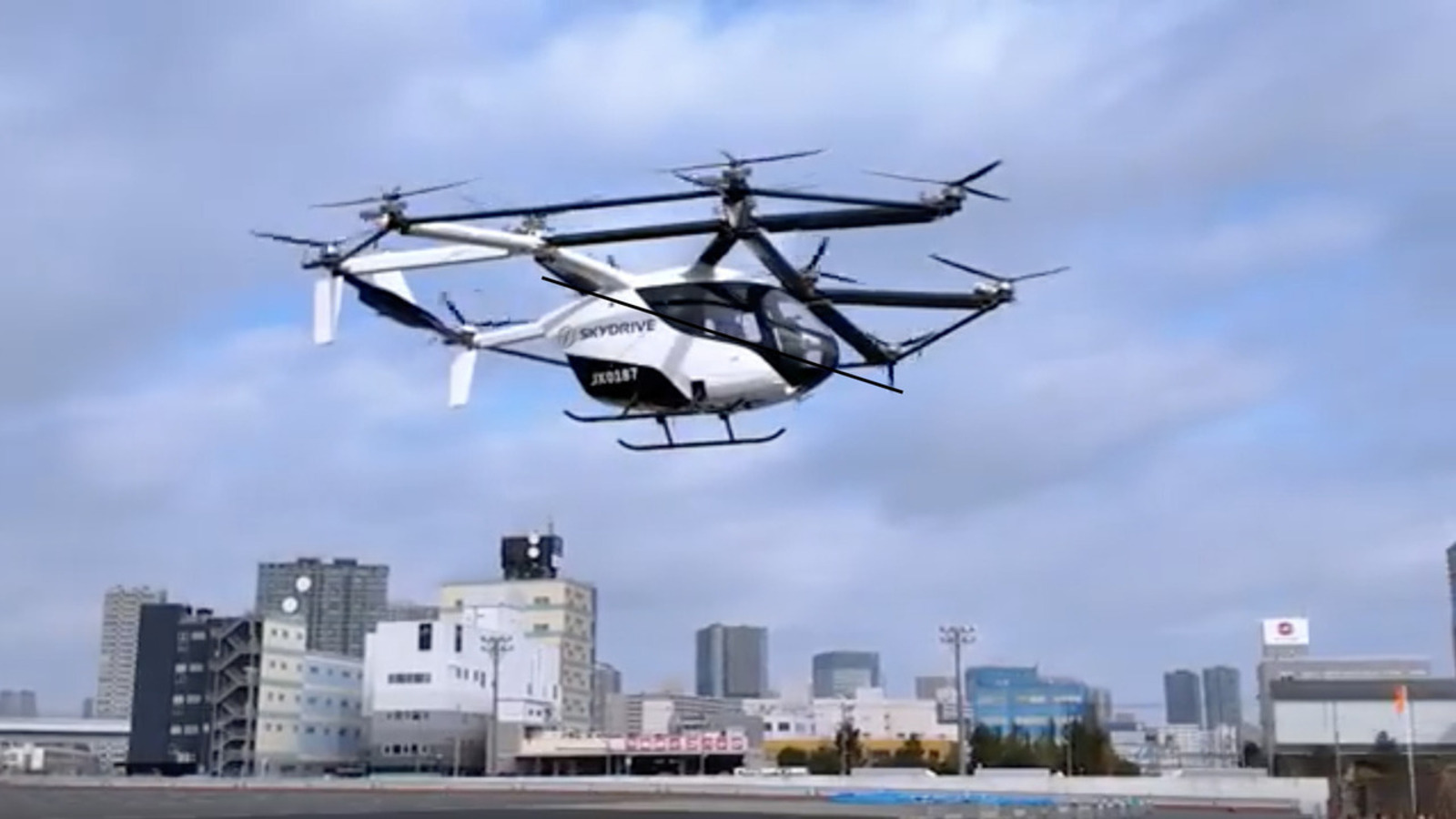 Японнар күктә очучы такси сынаганнар